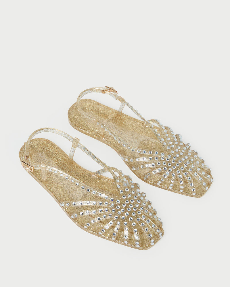 Devon Champagne Jelly Slingback Sandal in champagne jelly with crystal embellishments.