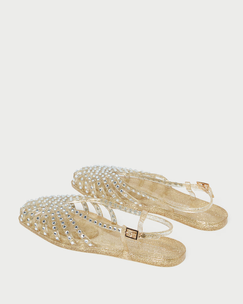Devon Champagne Jelly Slingback Sandal in champagne jelly with crystal embellishments.