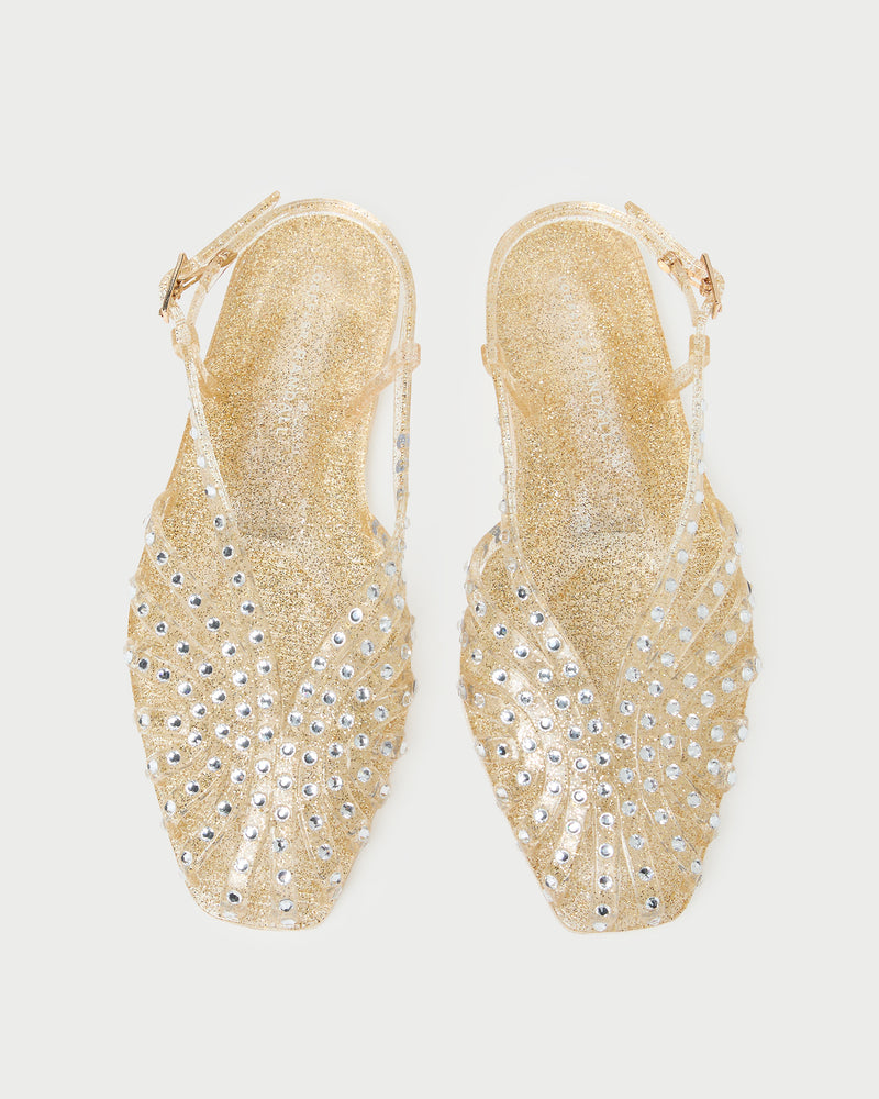 Devon Champagne Jelly Slingback Sandal in champagne jelly with crystal embellishments.