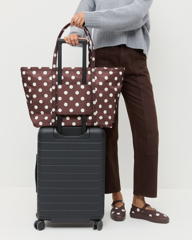 Dina Brown/Cream Travel Tote in brown and cream polka dot, Lana Cashmere Sweater in grey cashmere, Molly Workwear Jean in dark brown denim, and Cooper Brown/Cream Mary Jane Sneaker in brown and cream polka dot.