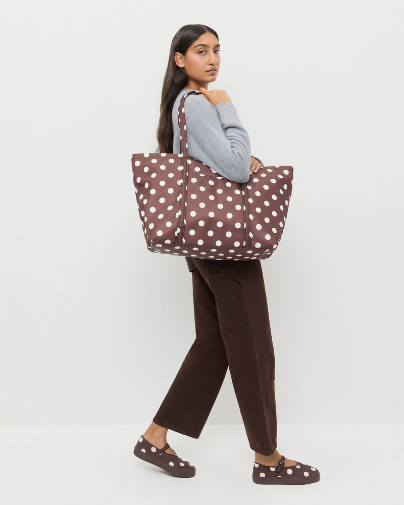 Dina Brown/Cream Travel Tote in brown and cream polka dot, Lana Cashmere Sweater in grey cashmere, Molly Workwear Jean in dark brown denim, and Cooper Brown/Cream Mary Jane Sneaker in brown and cream polka dot.