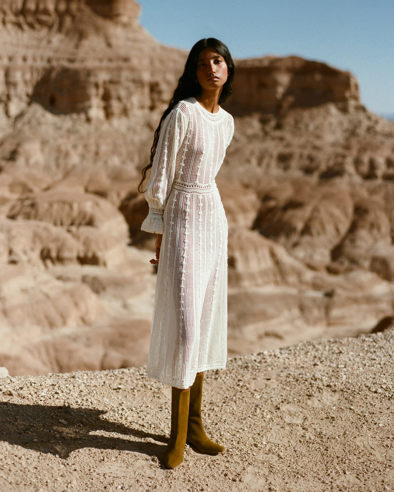 Dorothy Dress in crocheted cream cotton and Indy Cacao Suede Tall Boot.