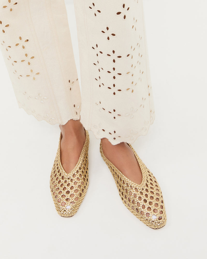 Emery Ballet Flat in crocheted gold leather and Demi Embroidered Pant in natural cotton.