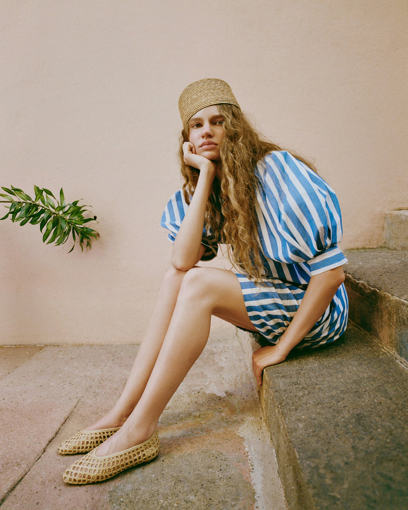 Emery Natural Crochet Ballet Flat in natural crochet raffia and Willy Mini Dress in blue and cream striped cotton.