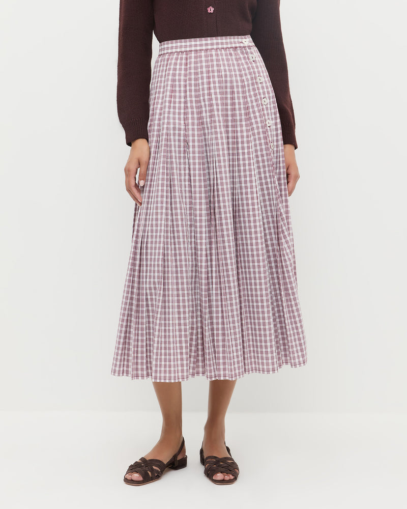 Emlyn Midi Skirt in cream, maroon, and lilac plaid cotton, Wynn Cardigan in dark brown wool, and Shelly Brown Suede Flat Sandal.