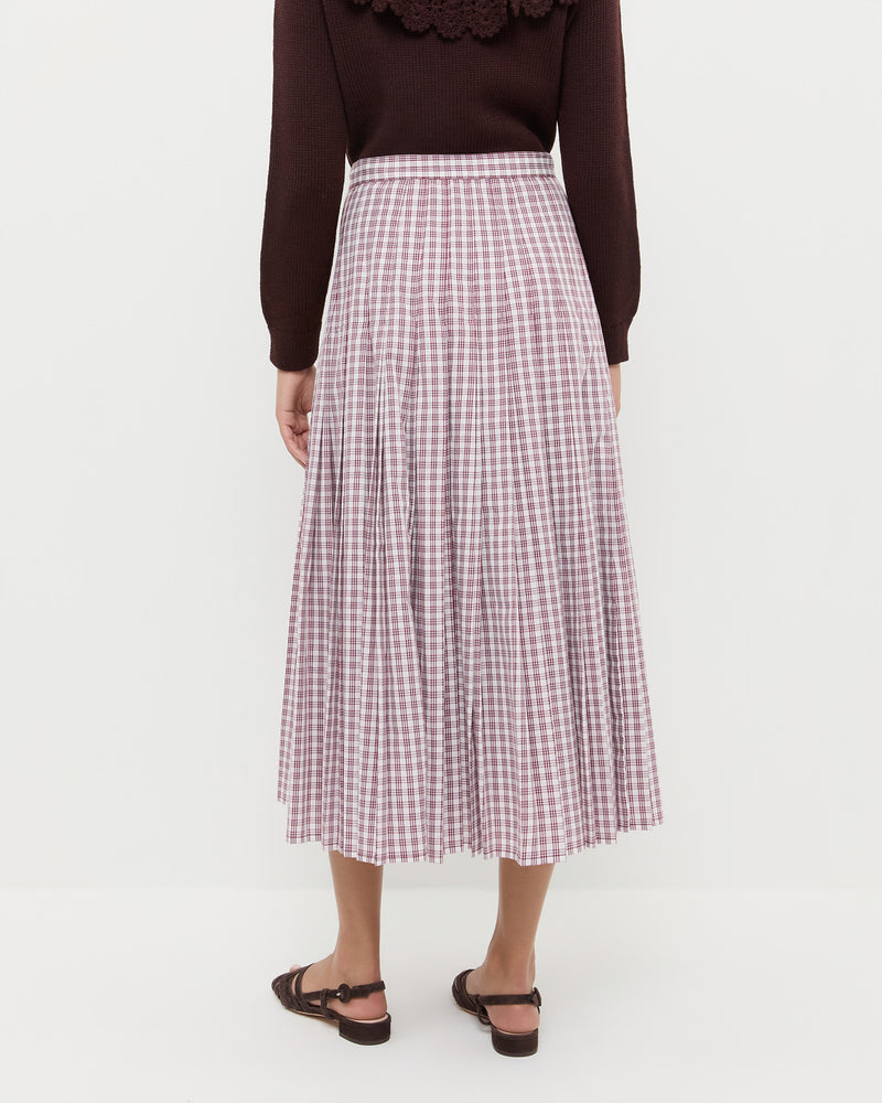 Emlyn Midi Skirt in cream, maroon, and lilac plaid cotton, Wynn Cardigan in dark brown wool, and Shelly Brown Suede Flat Sandal.