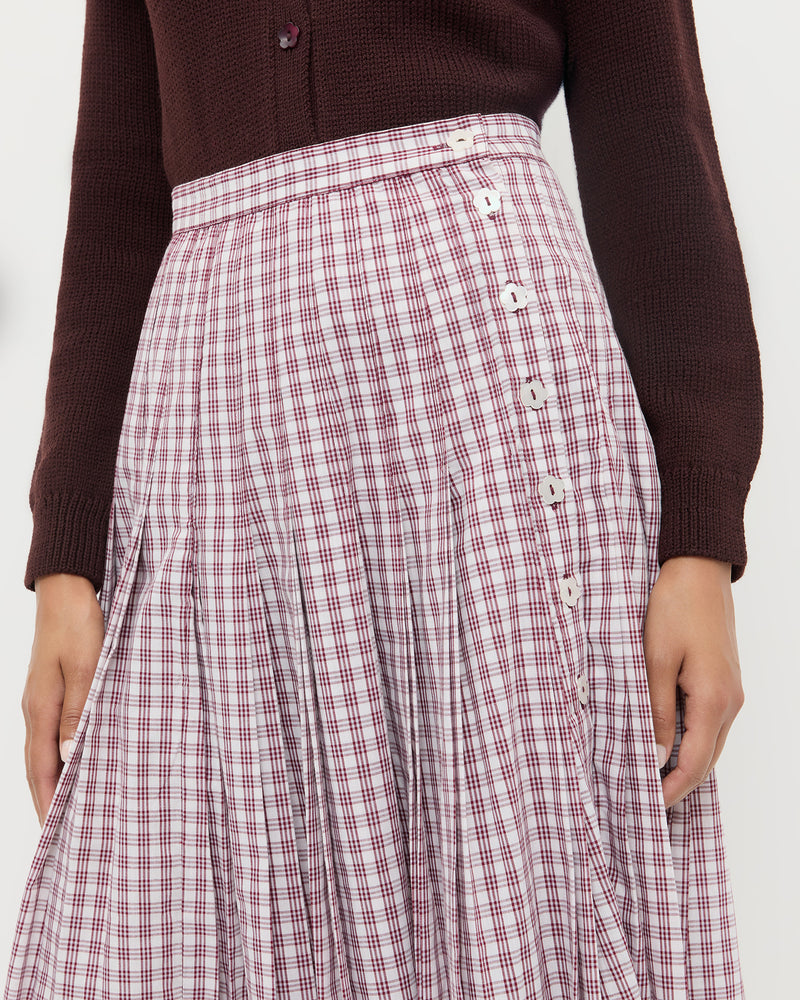 Emlyn Midi Skirt in cream, maroon, and lilac plaid cotton and Wynn Cardigan in dark brown wool.