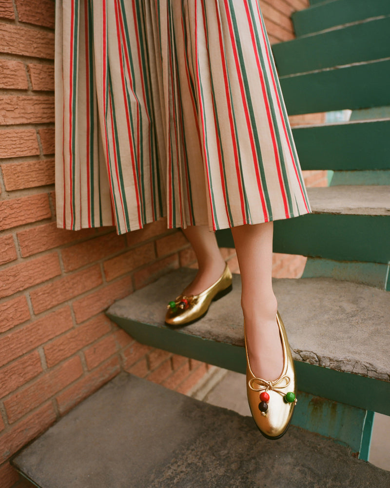 Emlyn Midi Skirt in tan, green, and red striped cotton and Noelle Champagne/Beads Ballet Flat.