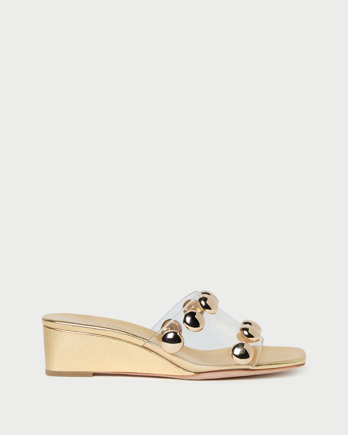 Enya Gold/Champagne Studded Wedge in gold leather.