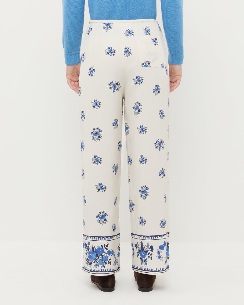 Esha Pant in cream and blue silk, Wynn Cardigan in cornflower blue wool, and Noelle Brown Suede Ballet Flat.