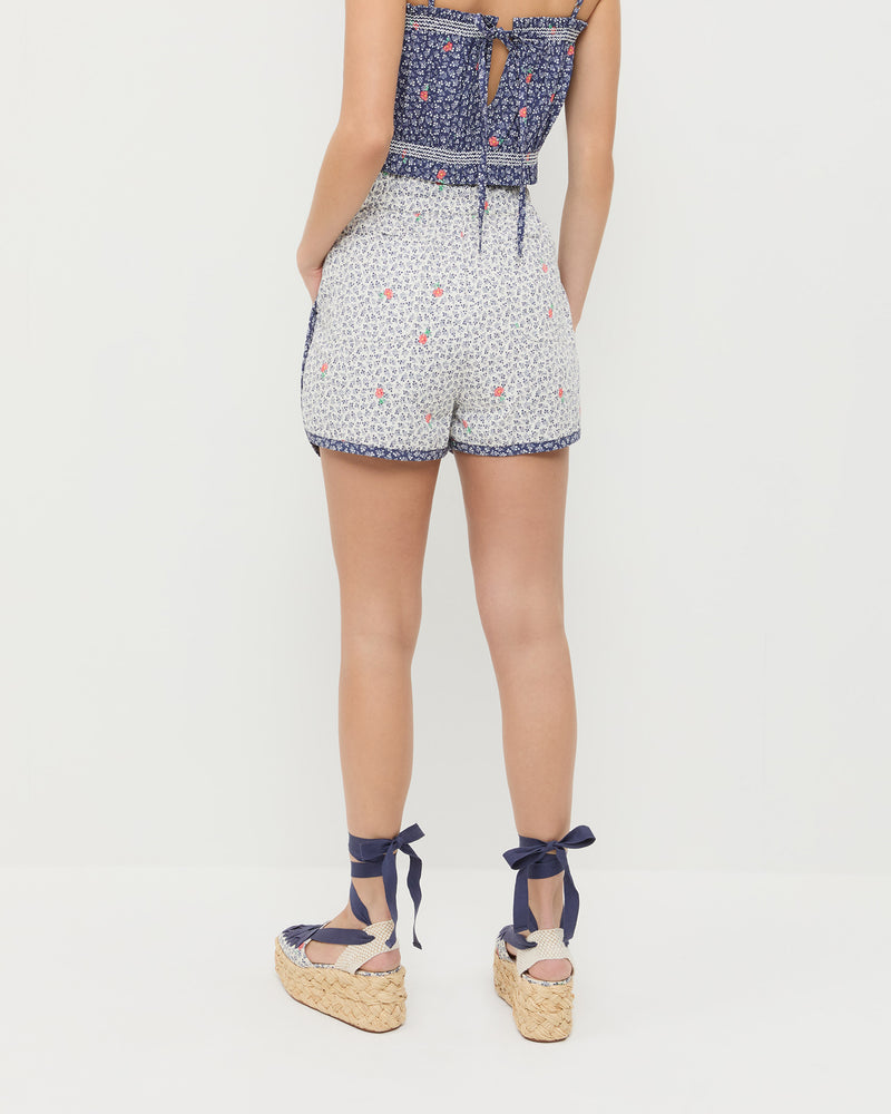 Flynn Quilted Short in white floral cotton, Maggie Camisole in navy floral cotton, and Mason Natural/Floral Platform Espadrille.