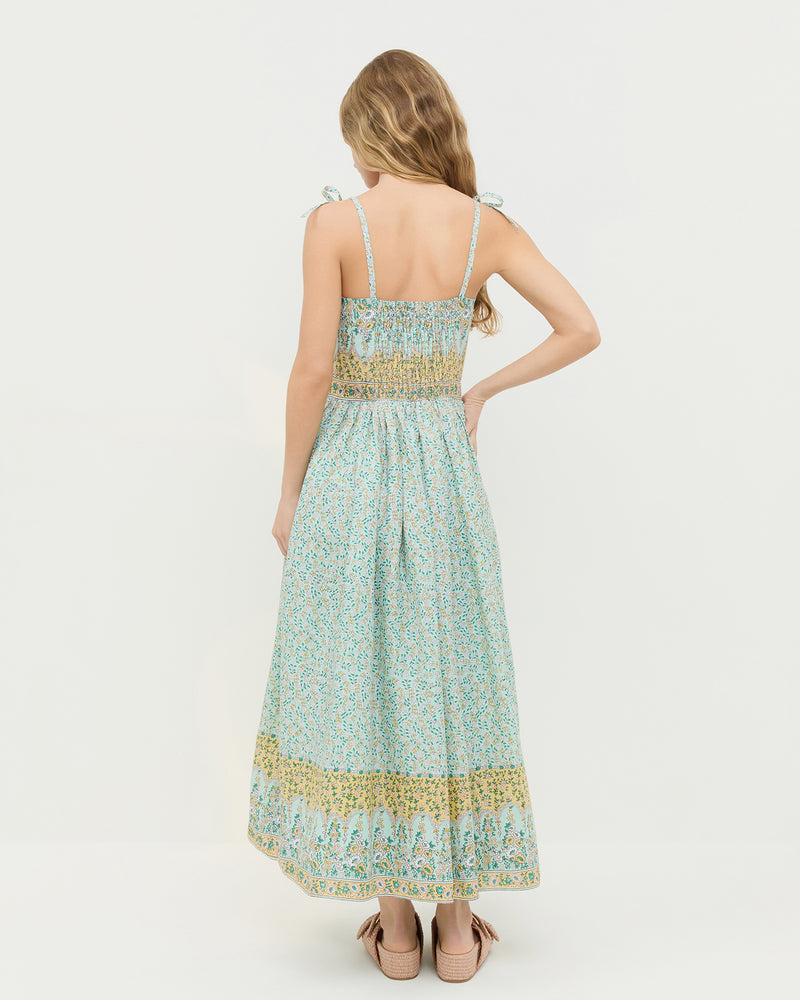 Gaia Dress in mint and yellow floral ramie and Nico Blush Two-Band Sandal. 