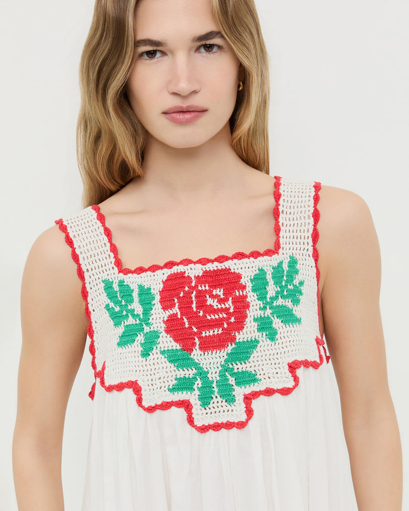 Hetty Dress in white cotton with hand embroidered crochet flower.