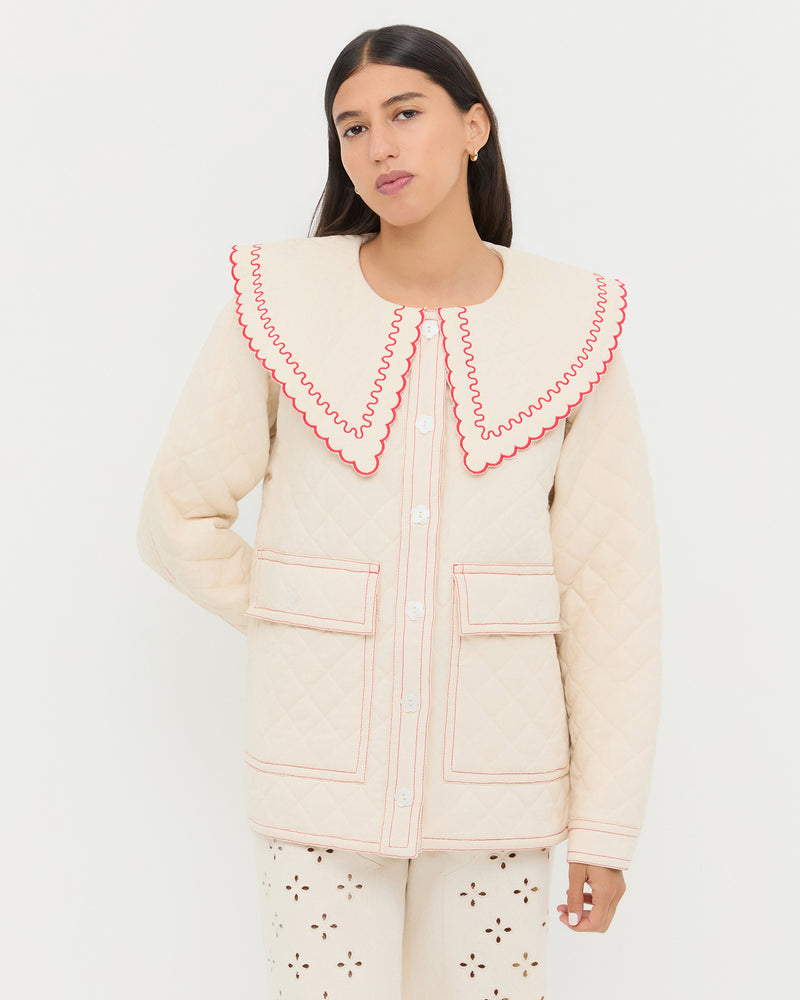 James Natural/Poppy Workwear Jacket in natural and red quilted cotton and Demi Embroidered Pant in natural cotton.