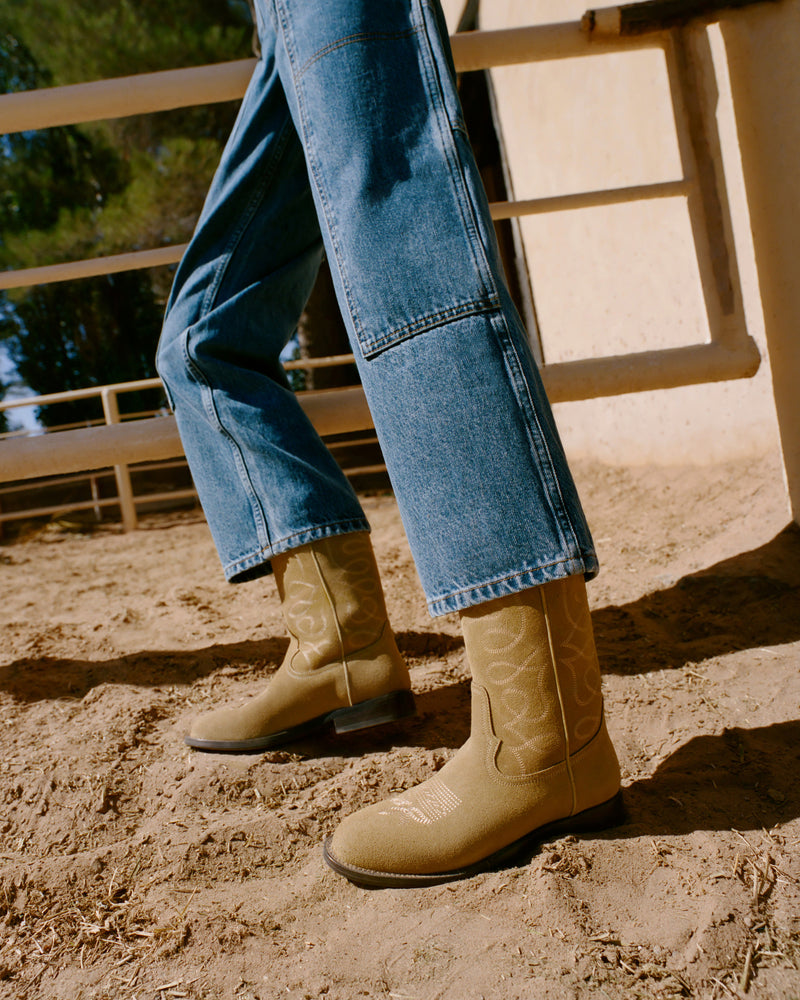 Jett Sand Suede Calf Boot in sand tan suede and western inspired and Molly Workwear Jean in medium washed denim.