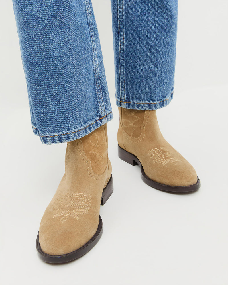 Jett Sand Suede Calf Boot in sand tan suede and western inspired and Molly Workwear Jean in medium washed denim.