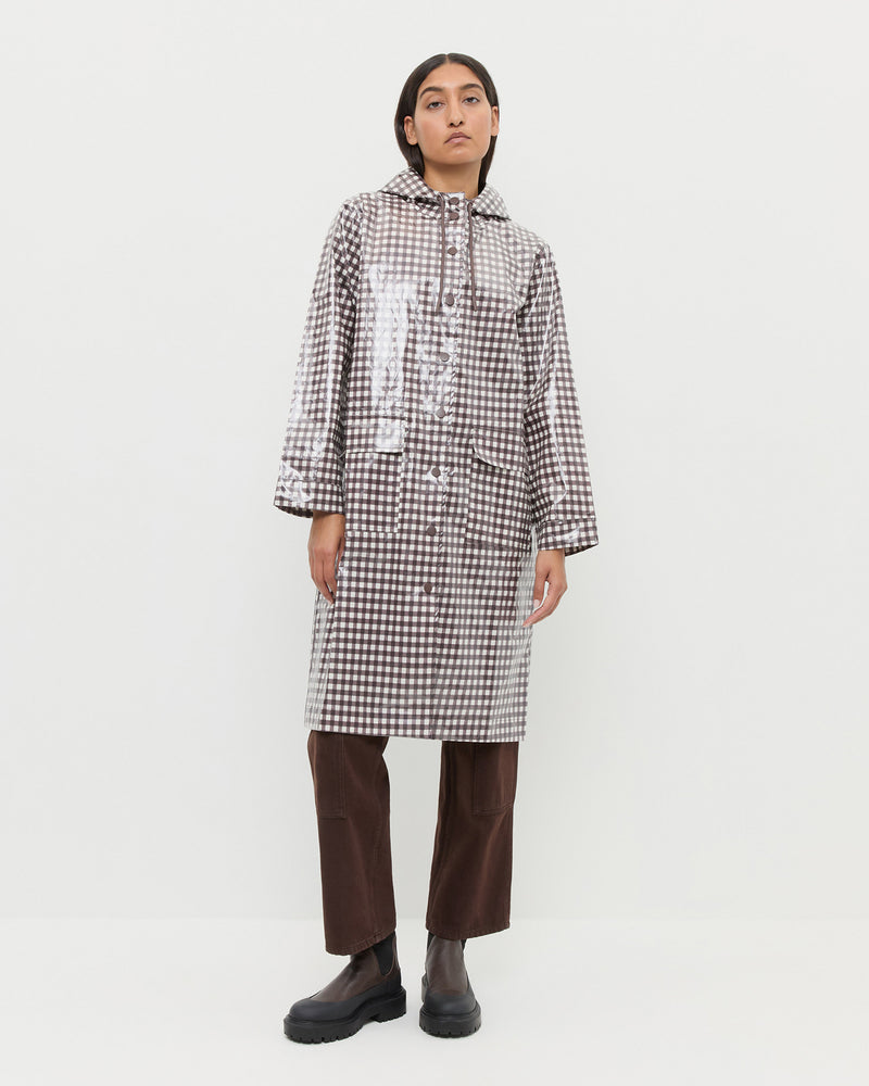 Kat Rain Coat in brown gingham cotton, Molly Workwear Jean in dark brown denim, and Suri Brown Leather Lug Boot.