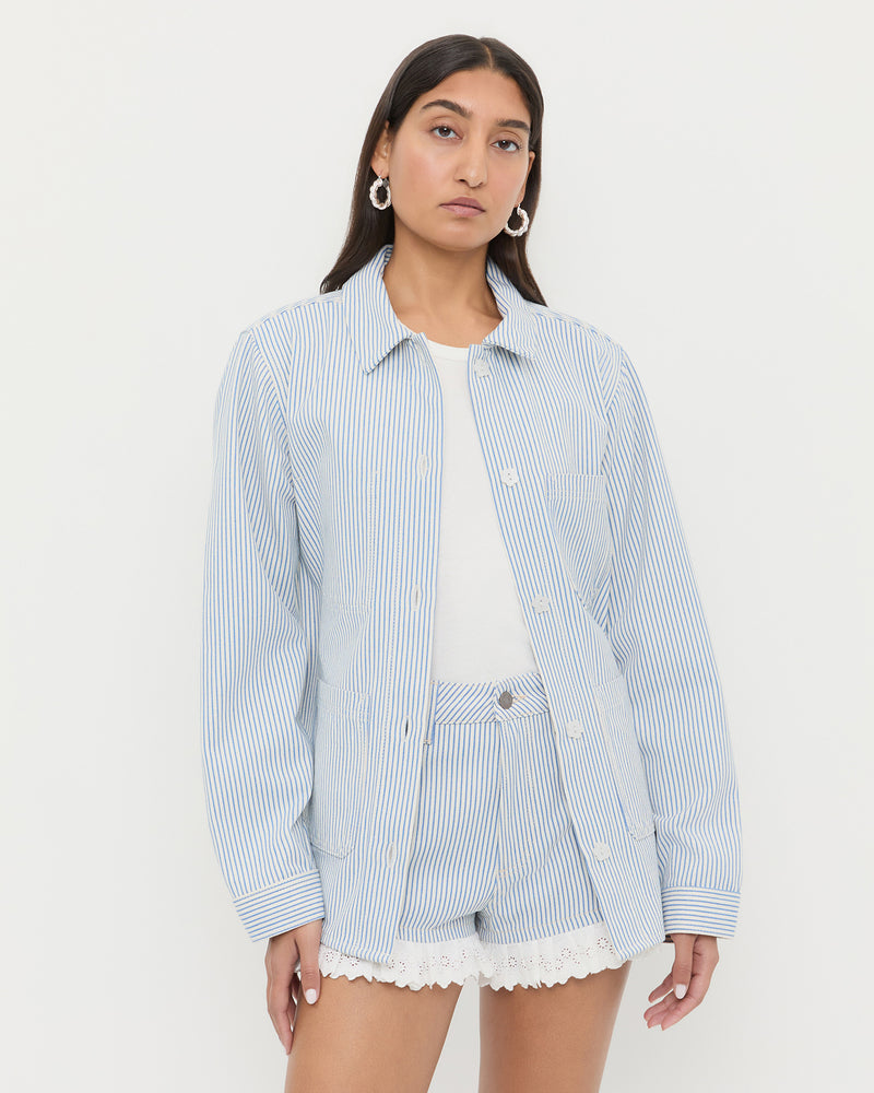 Kennedy Workwear Jacket in blue striped cotton and Kay Lace-Trimmed Denim Shorts in blue striped denim.