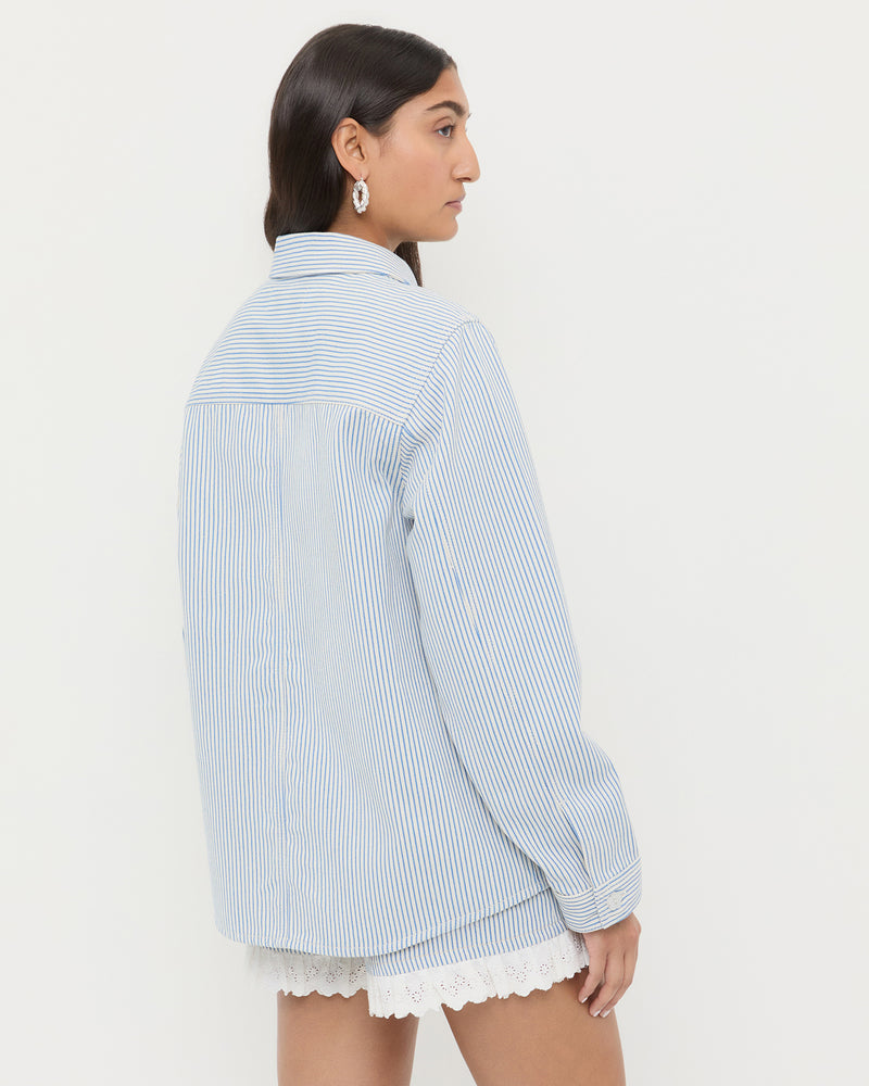 Kennedy Workwear Jacket in blue striped cotton and Kay Lace-Trimmed Denim Shorts in blue striped denim.