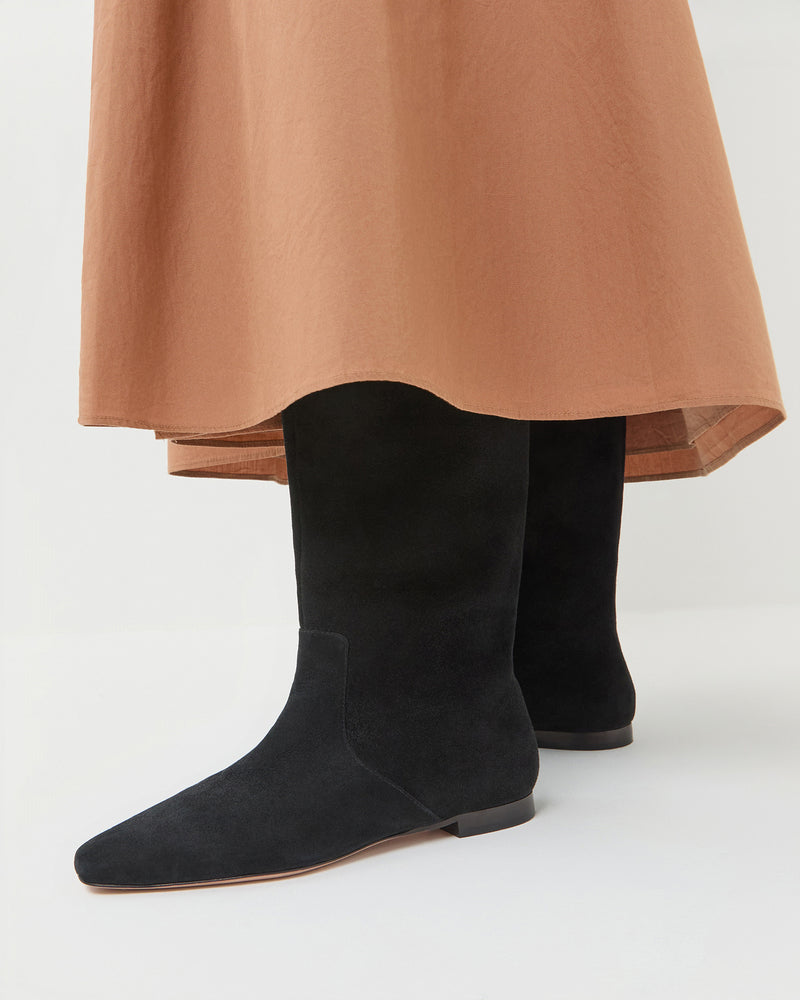Lillian Black Suede Tall Boot in black suede and Peyton Skirt.