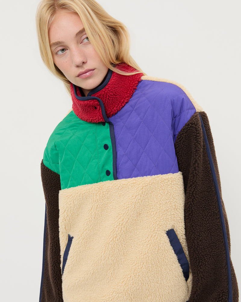 Liz Fleece in cream fleece with multi colored accents.