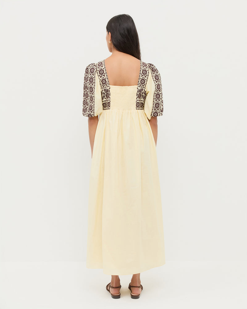 Lotus Embroidered Dress in butter yellow cotton with brown embroidery and Devon Chocolate Moiré Slingback Sandal.