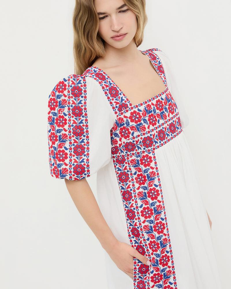 Lotus Embroidered Floral Dress in cream cotton with red and blue embroidery.