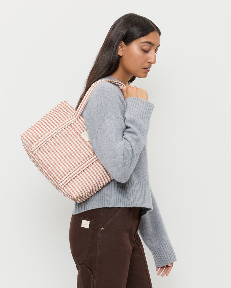 Lyla Brown Gingham Essential Tote, Lana Cashmere Sweater in grey cashmere, and Molly Workwear Jean in dark brown.