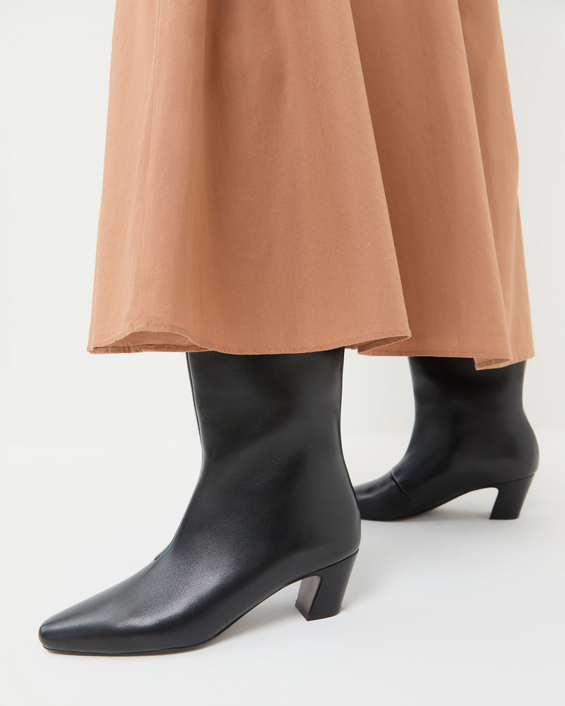 Marley Black Leather Tall Boot in black leather and Peyton Skirt.