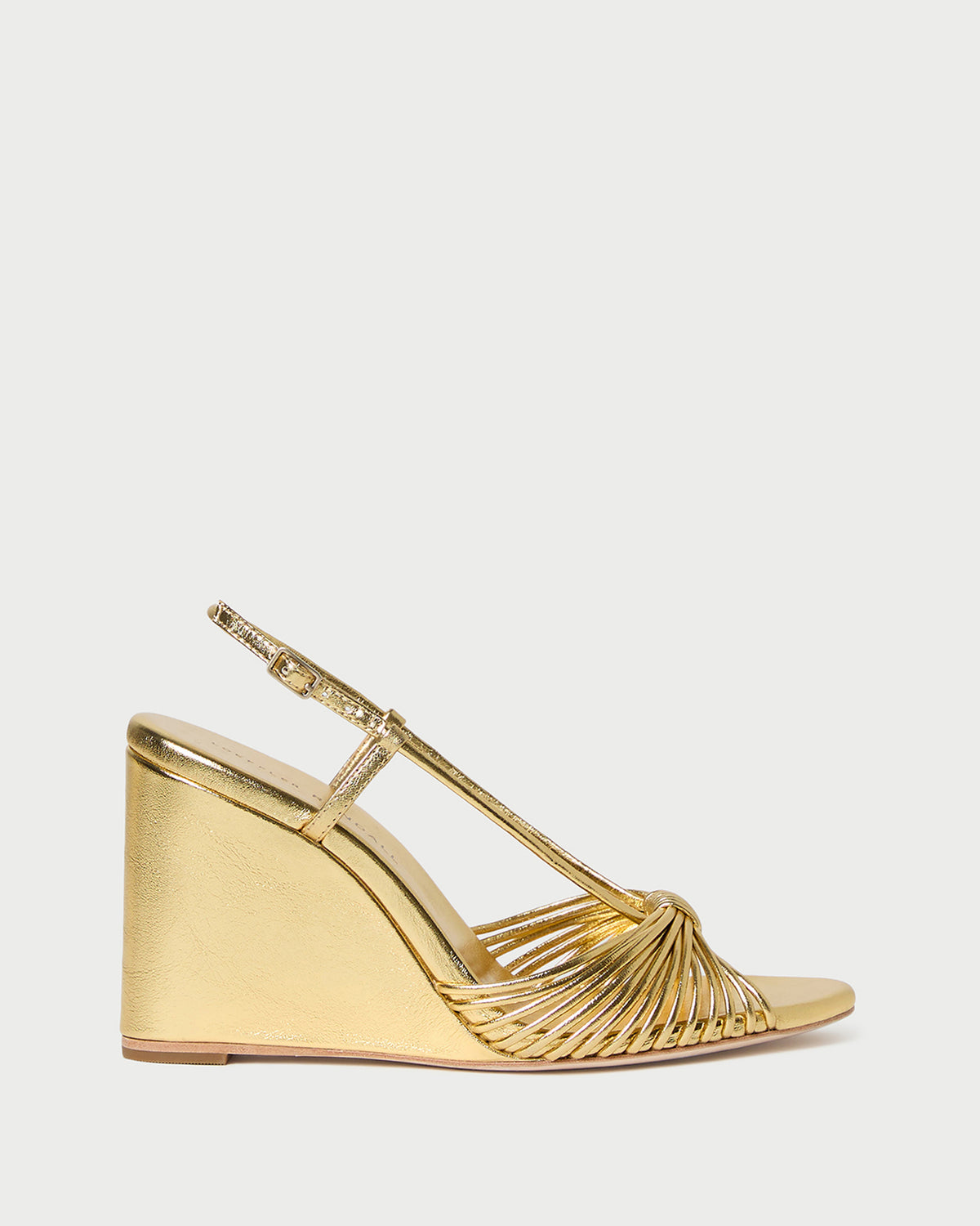 Marren Gold Leather Wedge in gold metallic leather.