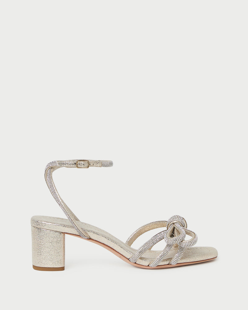 Mikel Cappuccino Bow Mid-Heel Sandal in light champagne sparkle suede