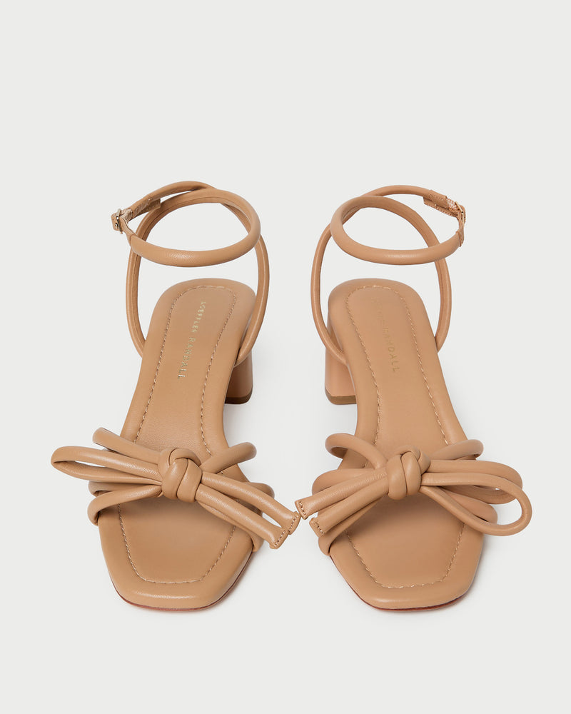 Mikel Dune Bow Mid-Heel Sandal in beige tan leather.