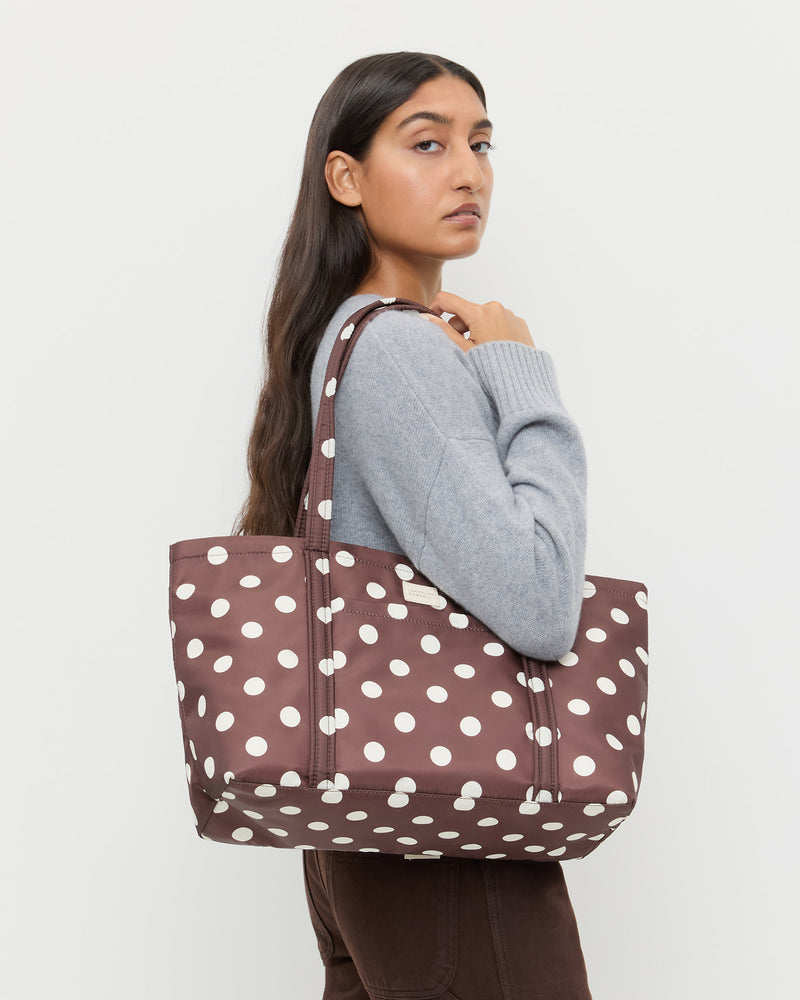 Mira Brown/Cream Everyday Tote in brown and cream polka dot, and Lana Cashmere Sweater in grey cashmere.