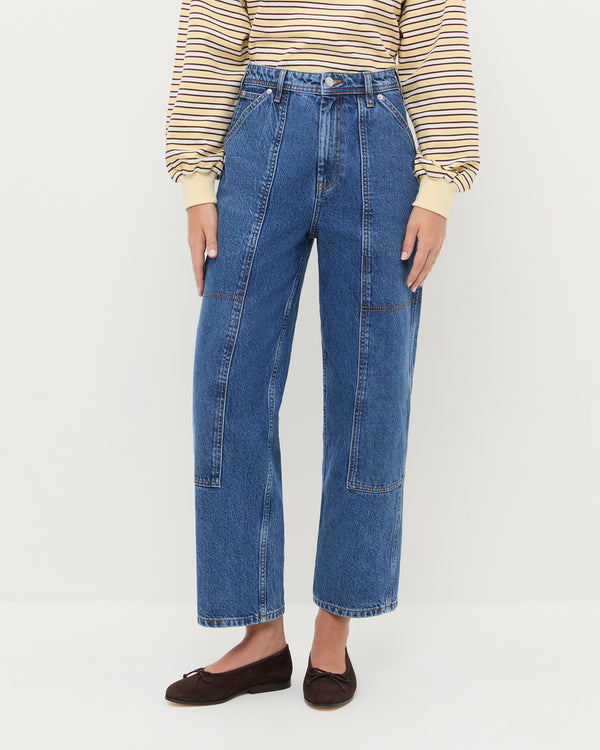 Molly Workwear Jean in medium wash blue denim, Scout Long-Sleeve Top in butter yellow, and Noelle Brown Suede Ballet Flat.