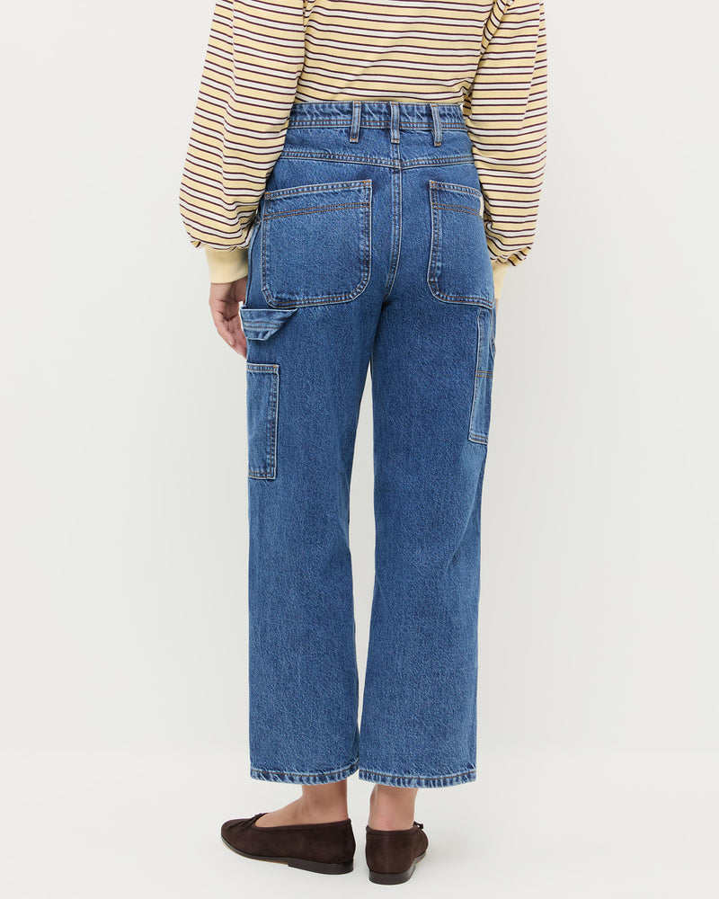 Molly Workwear Jean in medium wash blue denim, Scout Long-Sleeve Top in butter yellow, and Noelle Brown Suede Ballet Flat.