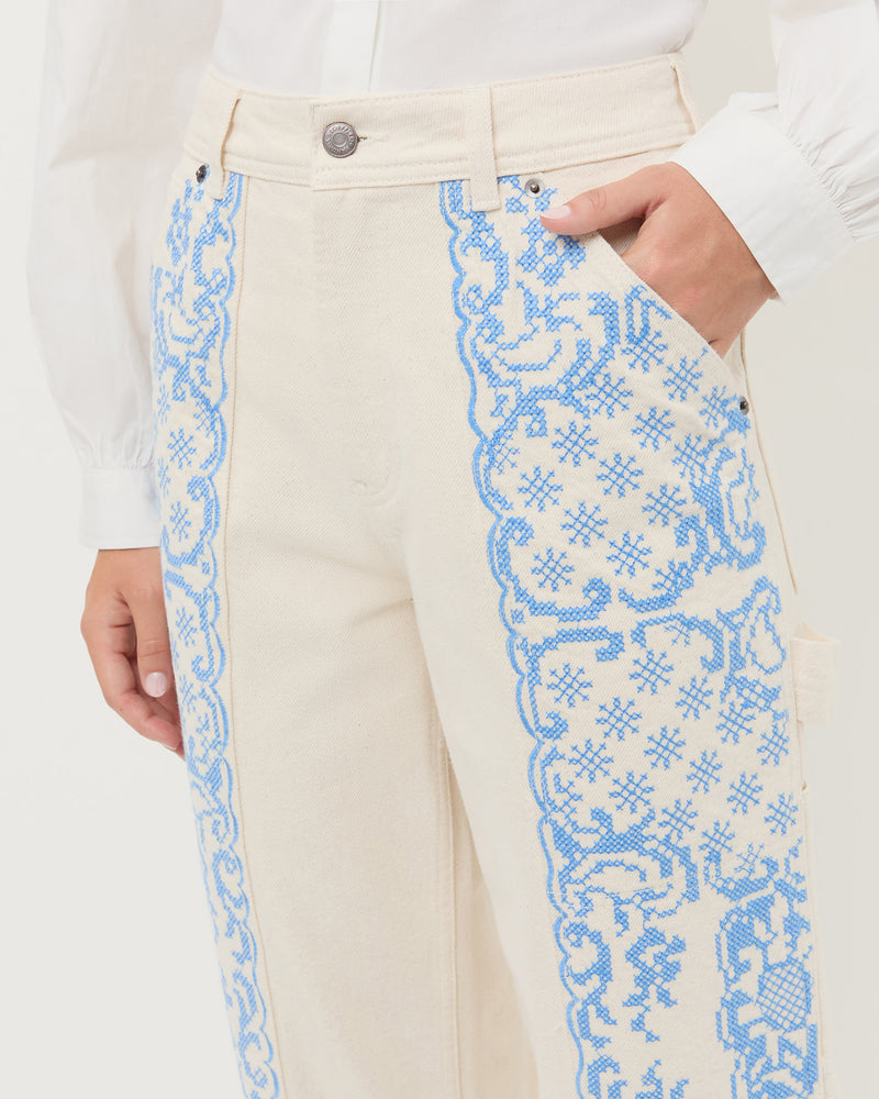 Molly Workwear Jean in natural denim with blue embroidery.