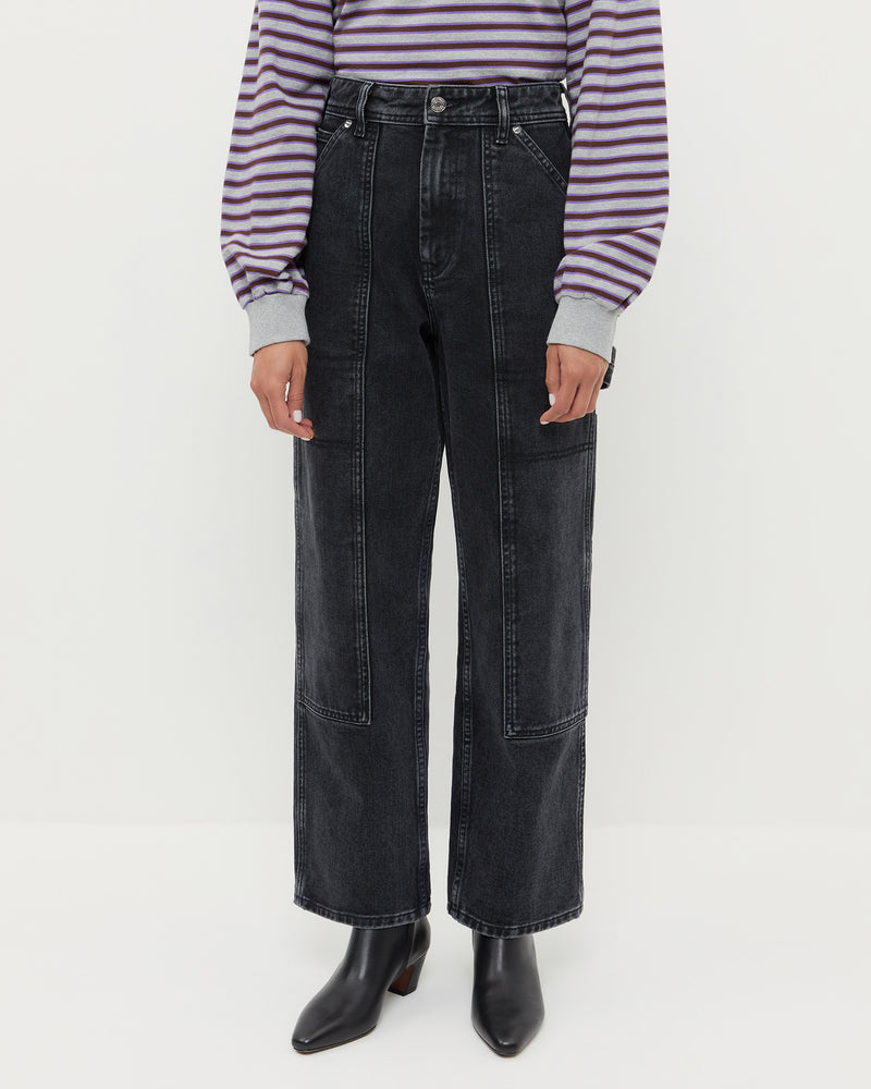 Molly Workwear Jean in washed black denim, Scout Long-Sleeve Top in grey and purple cotton, and Harper Black Leather Ankle Boot.
