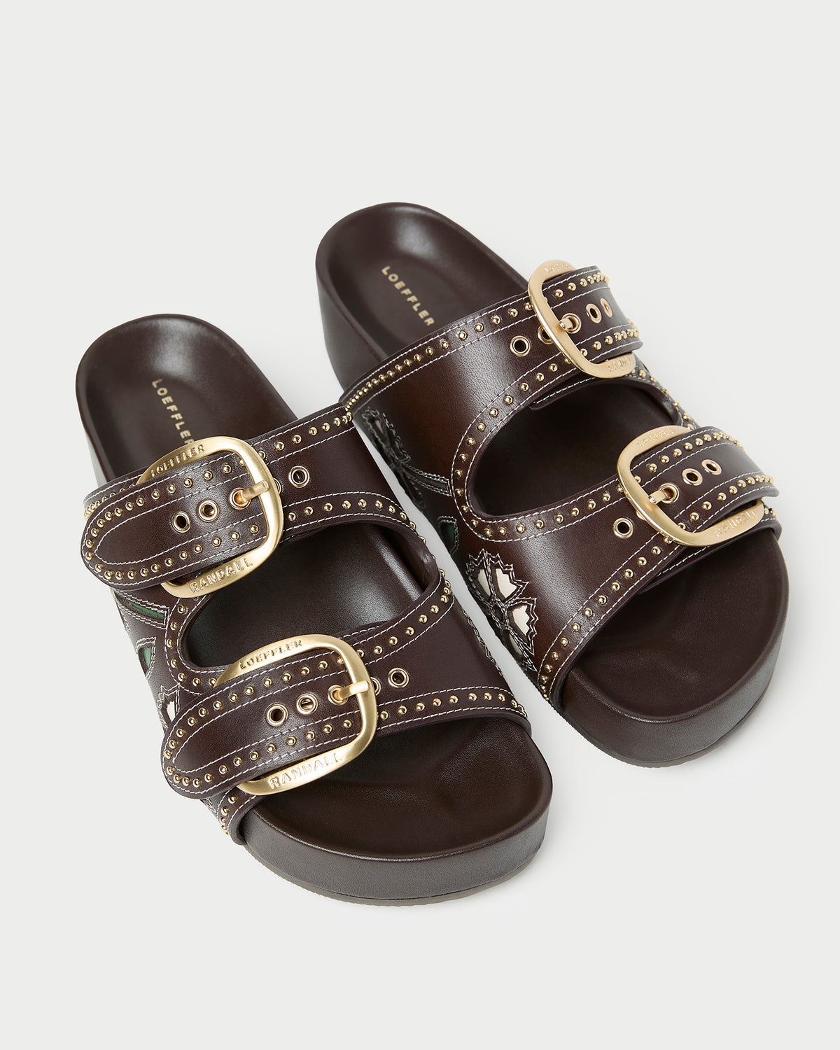 Nell Brown/Butter Two-Band Sandal with butter yellow tulip details and studded accents.