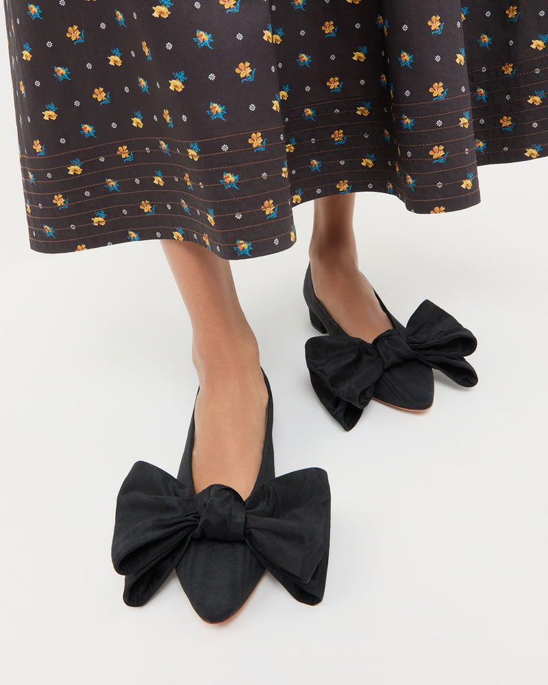 Noa Black Moiré Bow Flat in black moiré and Lilibeth Dress.