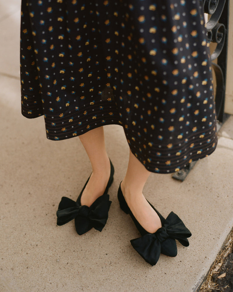 Noa Black Moiré Bow Flat in black moiré and Lilibeth Dress.