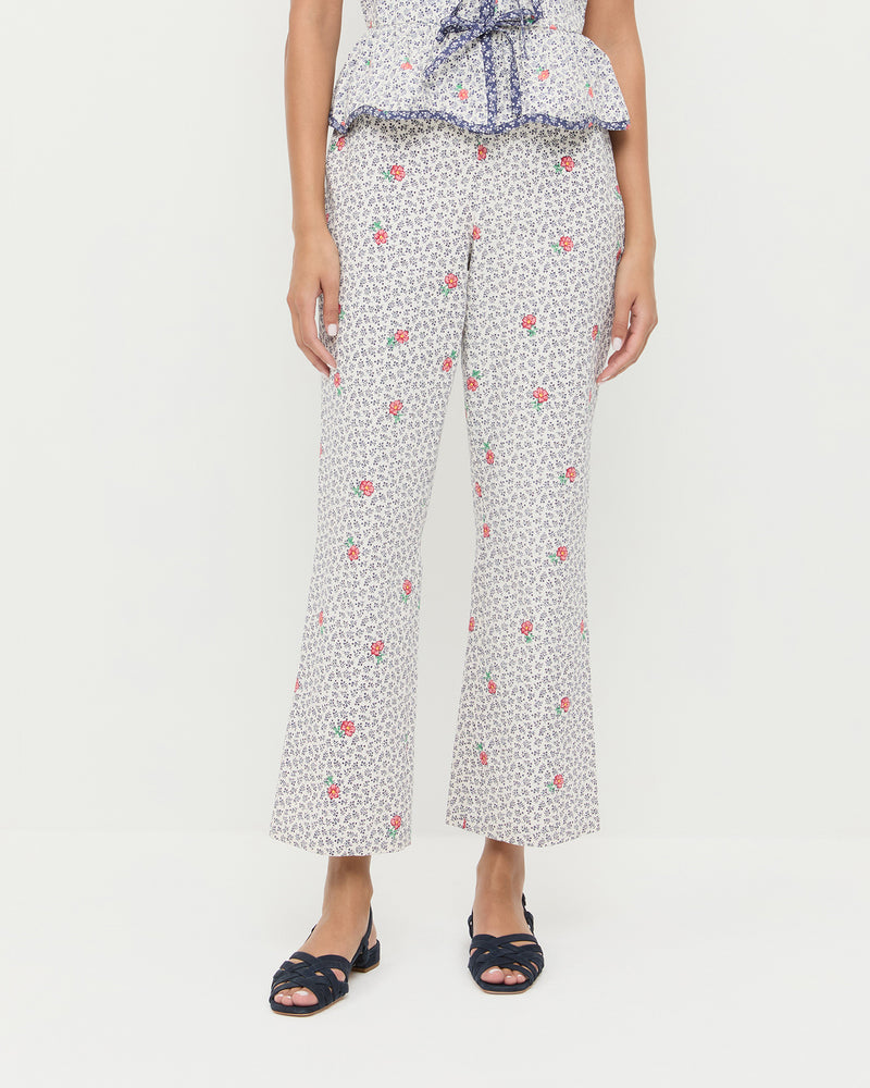 Pasha Trouser in white floral cotton-linen, Pilar Tie-Front Top in white floral cotton-linen, and Shelly Navy Suede Flat Sandal.