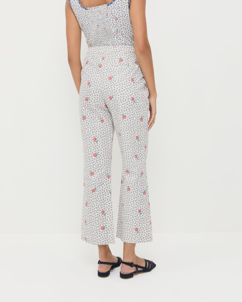 Pasha Trouser in white floral cotton-linen, Pilar Tie-Front Top in white floral cotton-linen, and Shelly Navy Suede Flat Sandal.