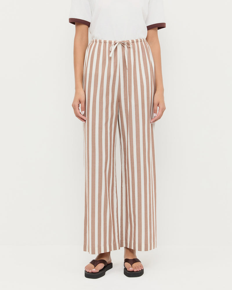 Pella Pant in brown/cream striped cotton, Harly Tee in white cotton, and Chase Brown Flip Flop.