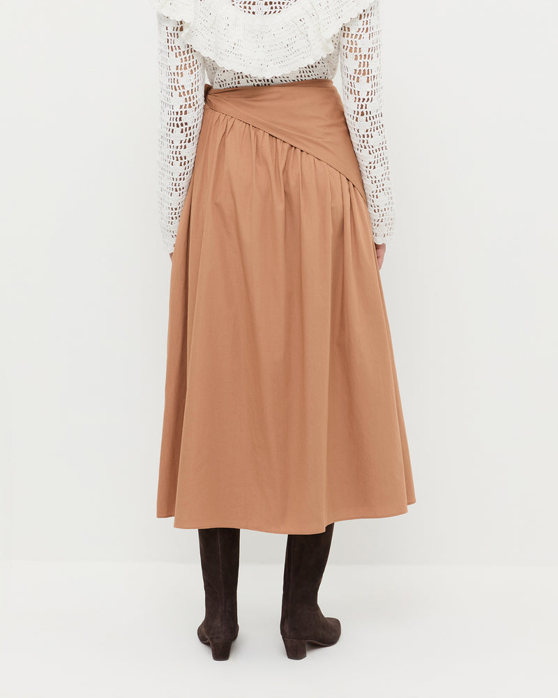 Peyton Skirt in light brown cotton, Abigail Top in cream cotton, and Cleo Brown Suede Boot.