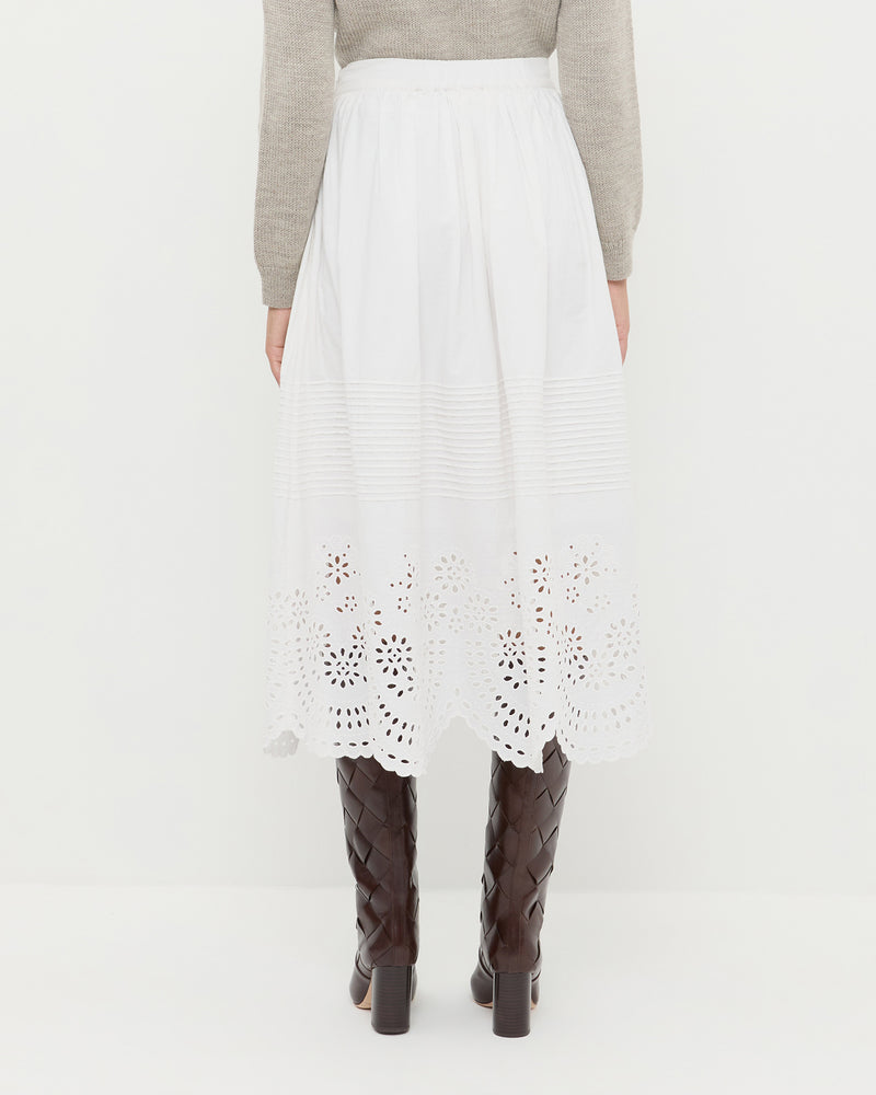 Tinsley Broderie Skirt in cream cotton, Wynn Cardigan in grey wool, and Goldy Espresso Woven Leather Tall Boot.