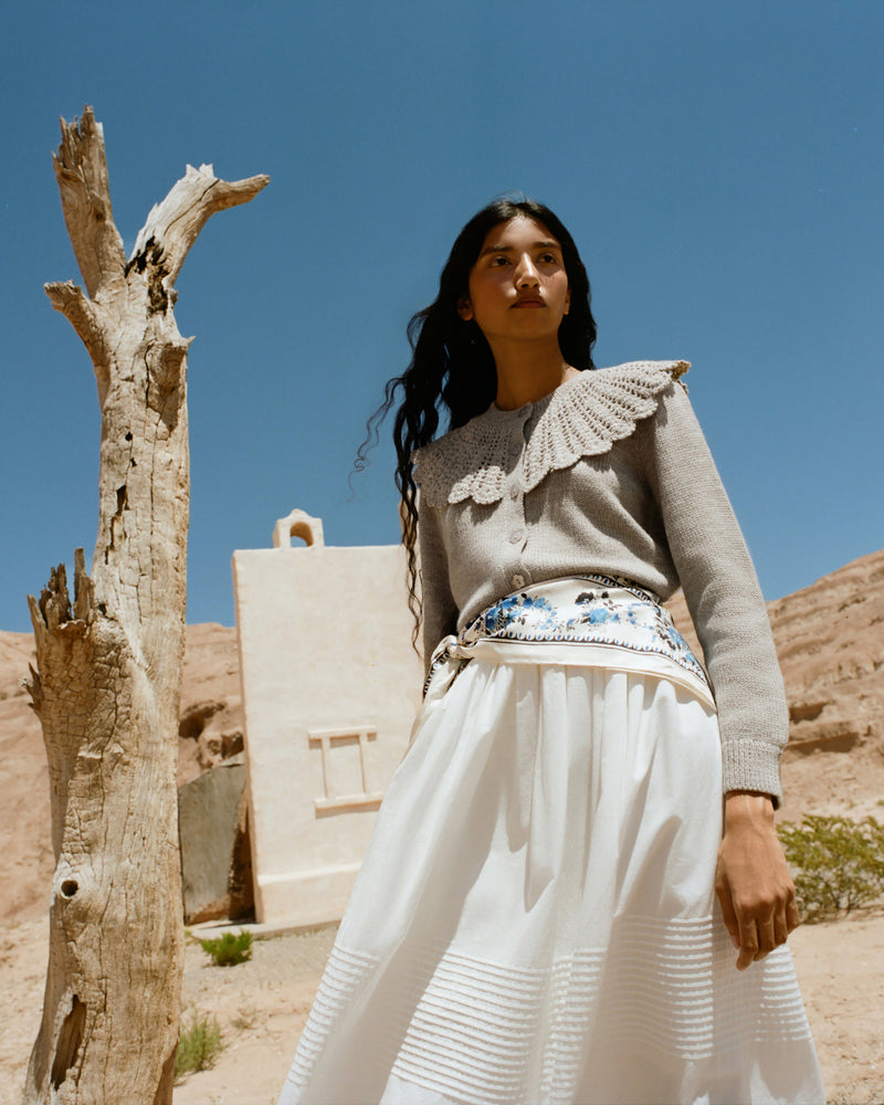 Wynn Cardigan in grey wool, and Tinsley Skirt in white cotton.